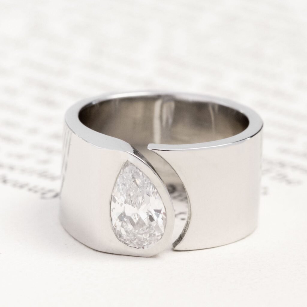 1.01ct Pear Cut Diamond Open Cigar Band, GIA