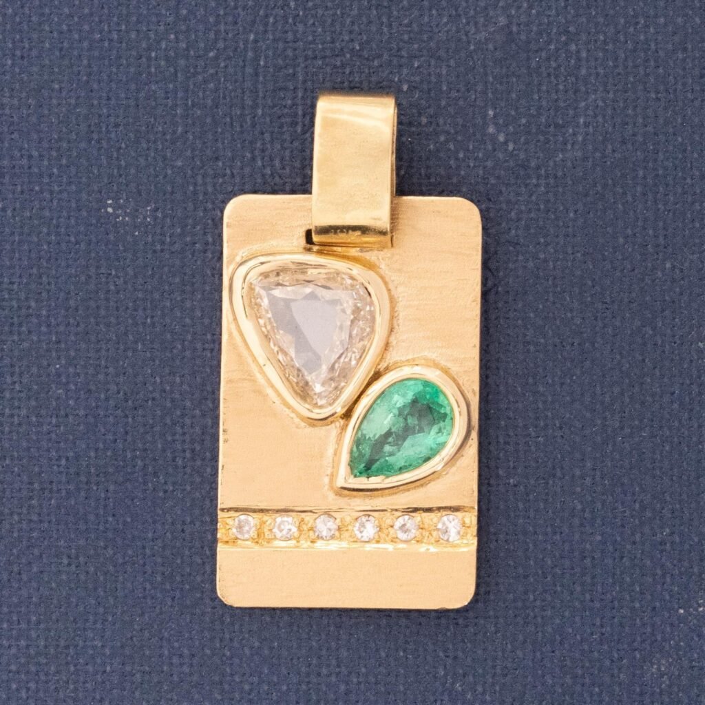 1.18ctw Diamond & Emerald Pear Cut Dog Tag Pendant