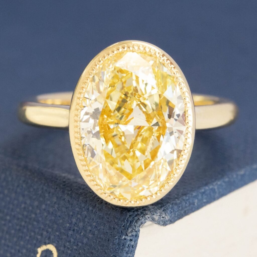 4.70ct Fancy Yellow Oval Diamond Ring