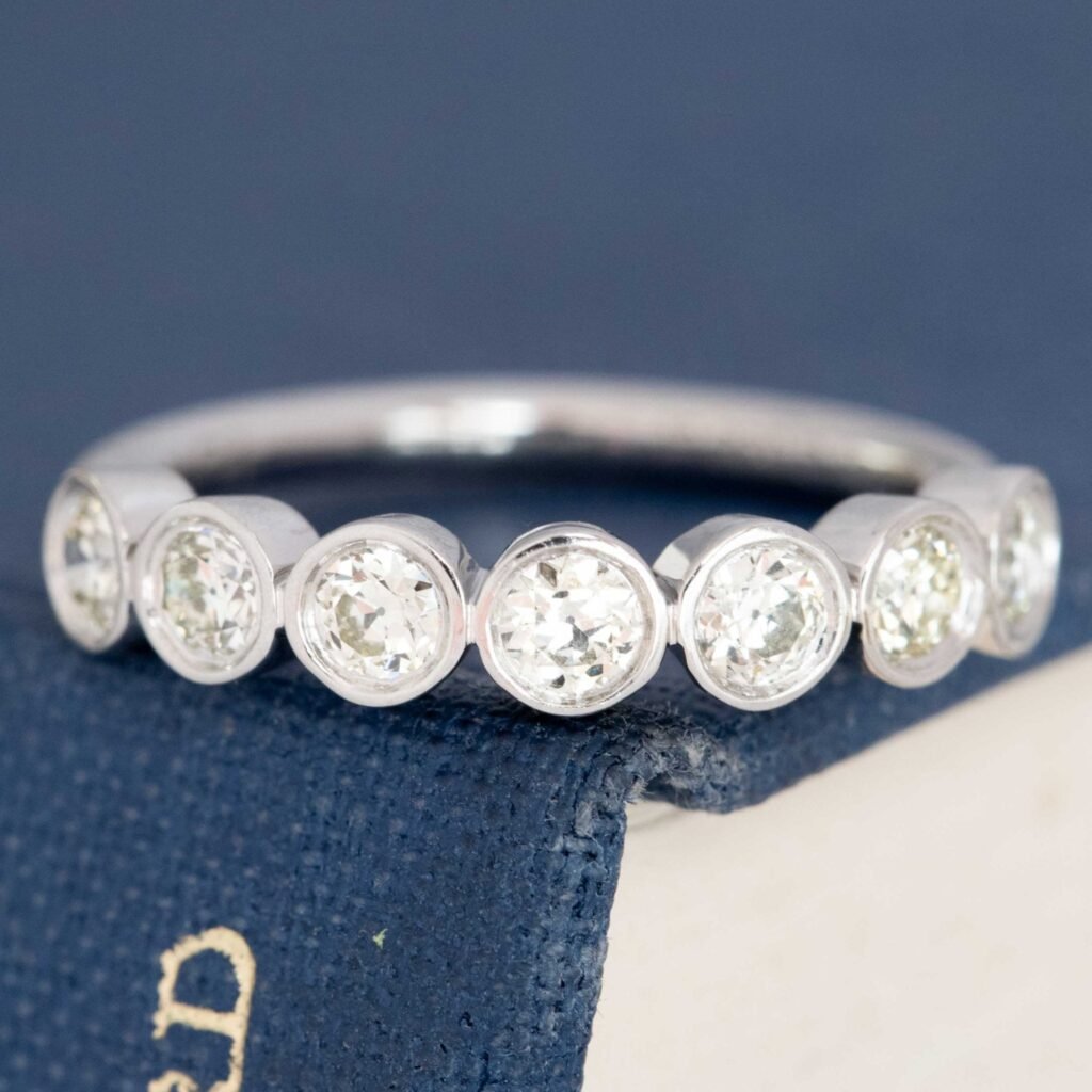 .56ctw Petite Old European Cut Diamond Bezel 7-Stone Band