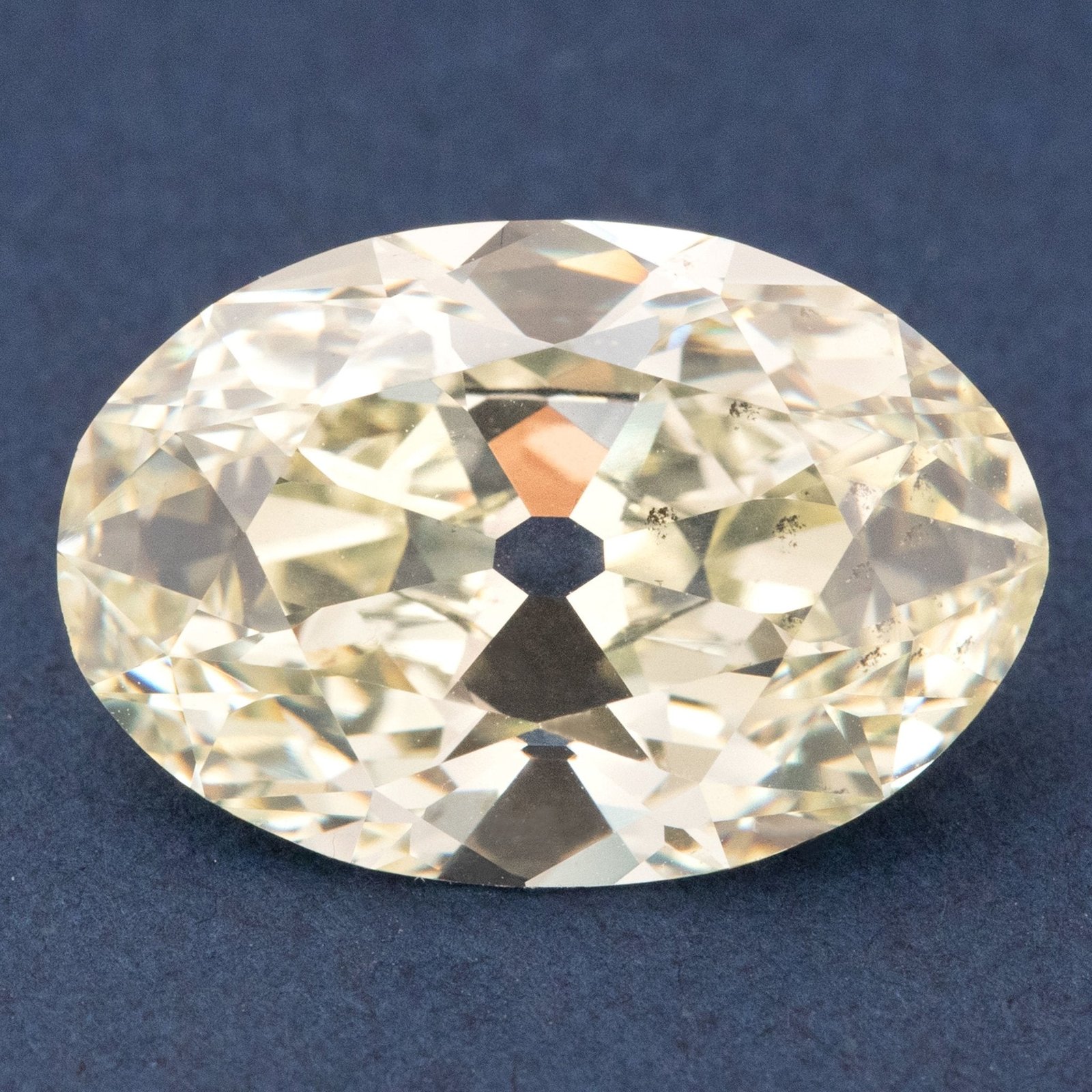 6.41ct Antique Light Yellow Oval Cut Diamond, GIA