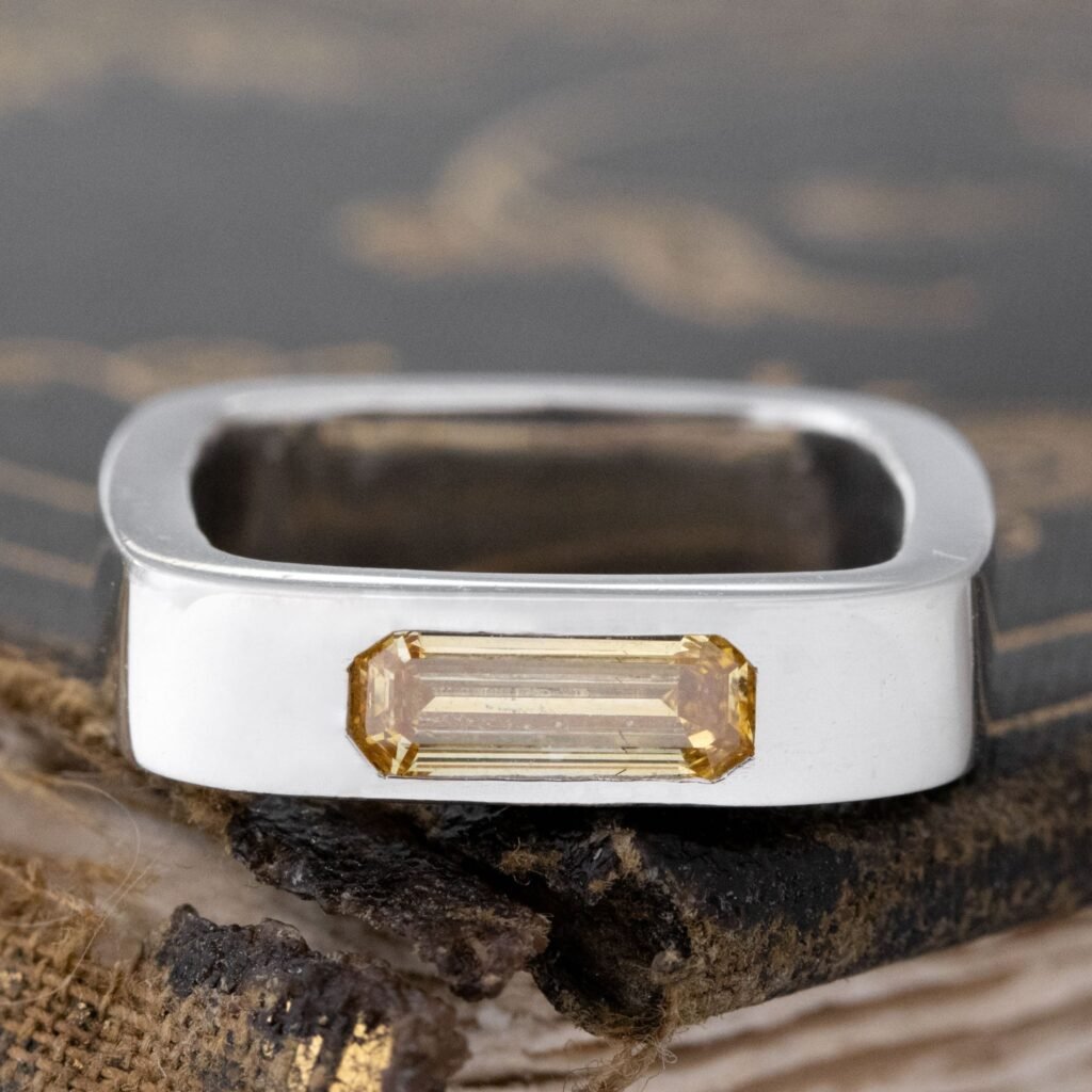 .70ct Fancy Yellow Brown Baguette Cut Diamond Square Shank Band, GIA