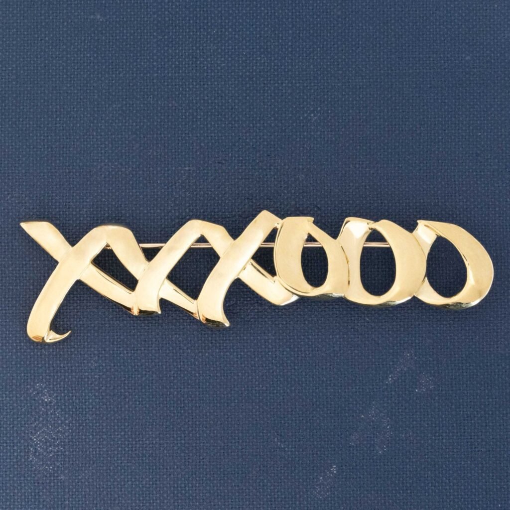 Vintage Hugs & Kisses XO Brooch, by Paloma Picasso for Tiffany & Co.